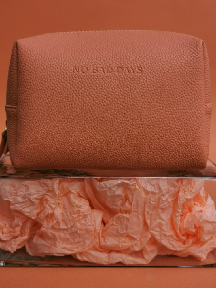Tan coloured beauty bag with zip