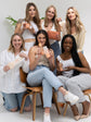 Group of girls with skincare products