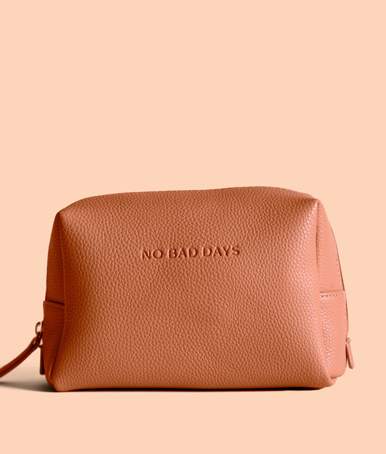 Tan coloured beauty bag with zip