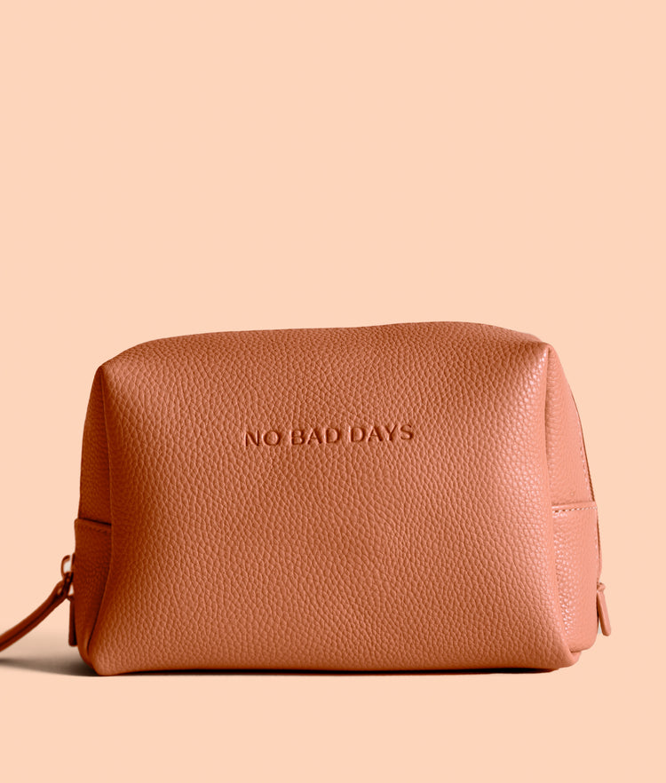 Tan coloured beauty bag with zip